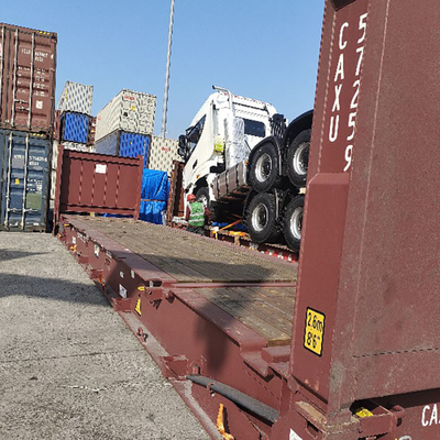 RORO/OOG Pengiriman Barang dari Agen Pengangkutan Barang Cina Untuk Truk Pengeboran Dan Mesin Campuran Beton Dan Traktor